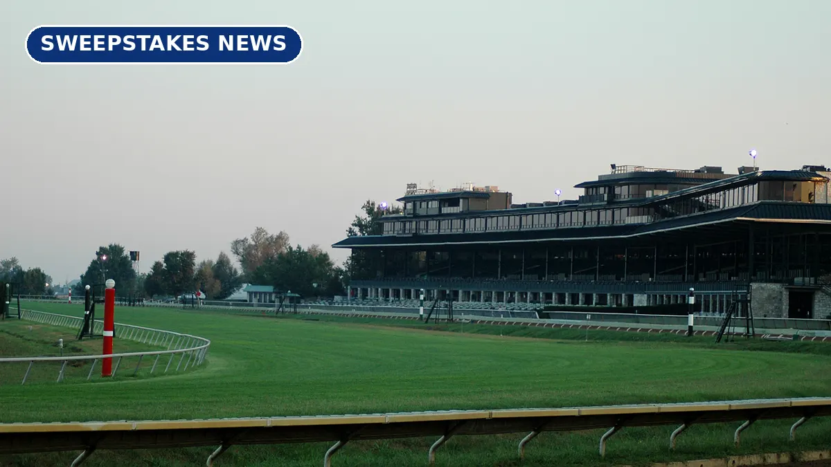 An empty green turf course and grandstand at Keeneland race track in the early morning