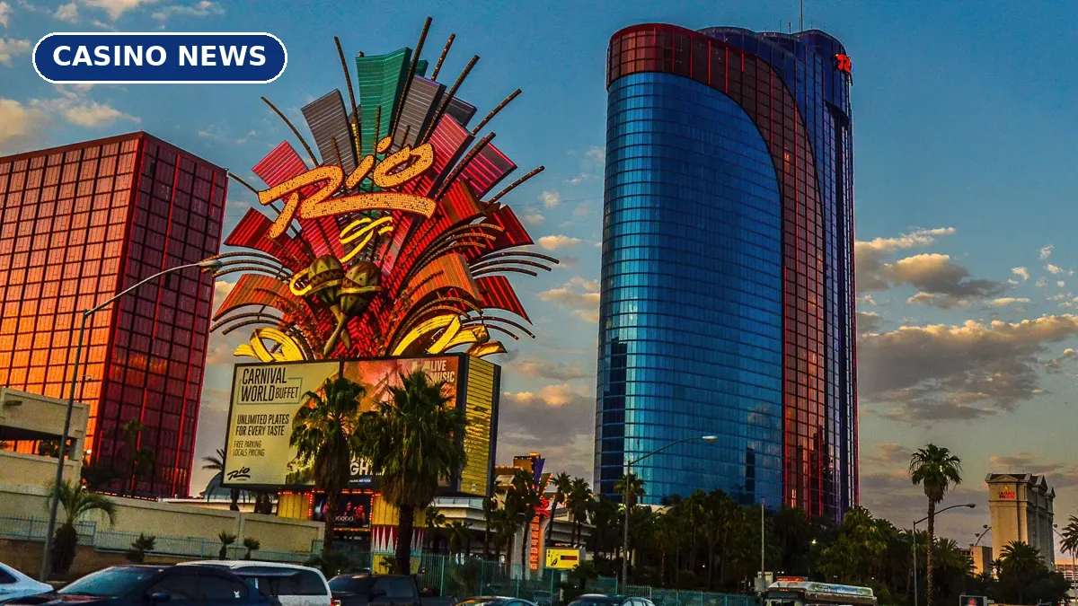 The Rio All-Suite Hotel & Casino sign and tower in Las Vegas at sunset