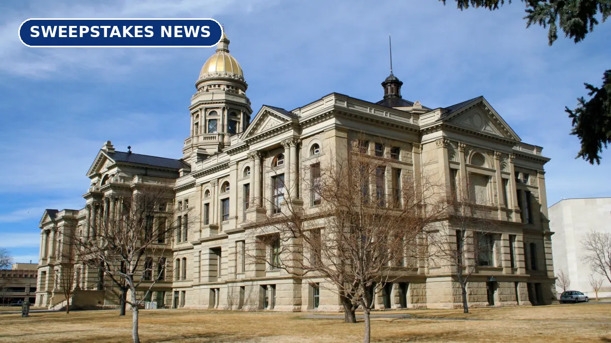 The Wyoming State Capitol in Cheyenne with its gold dome under a blue sky